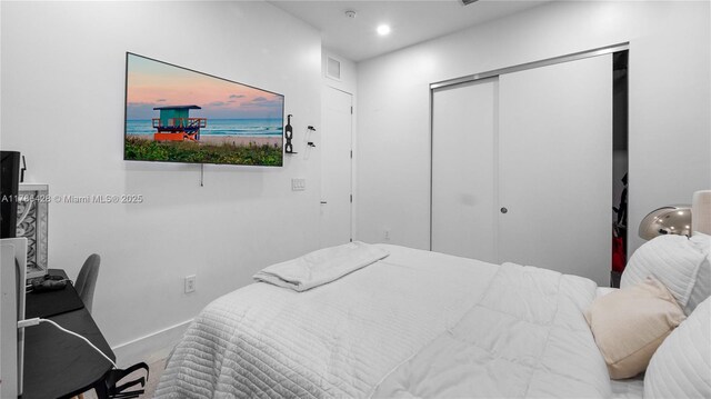 10603 NE 11th Ave, Miami Shores, FL 33138 - carpeted bedroom with a closet and baseboards