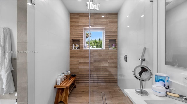 10603 NE 11th Ave, Miami Shores, FL 33138 - bathroom with a tile shower and wood finished floors