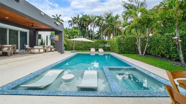 10603 NE 11th Ave, Miami Shores, FL 33138 - view of pool featuring ceiling fan, a patio area, and a pool with connected hot tub