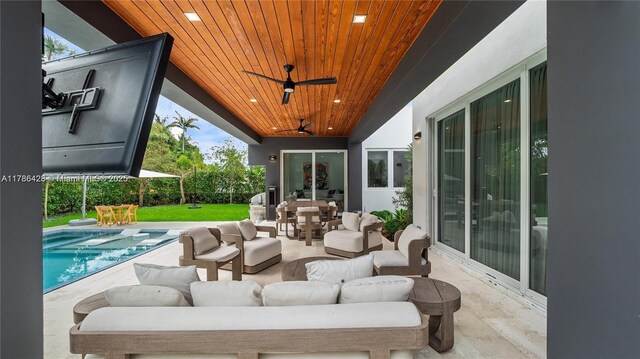10603 NE 11th Ave, Miami Shores, FL 33138 - view of patio / terrace featuring outdoor lounge area, ceiling fan, and outdoor dining space