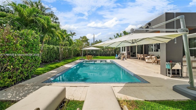 10603 NE 11th Ave, Miami Shores, FL 33138 - swimming pool with a patio area, a fenced backyard, and an outdoor living space