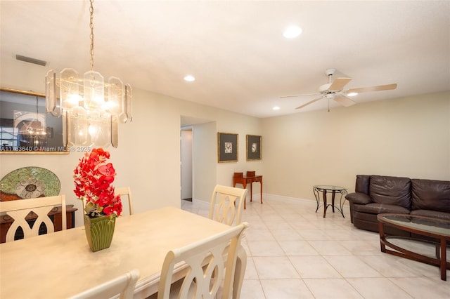 13940 Nesting Way Unit C, Delray Beach, FL 33484 - dining space with ceiling fan, recessed lighting, light tile patterned floors, and a chandelier