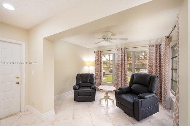 13940 Nesting Way Unit C, Delray Beach, FL 33484 - sitting room with a ceiling fan and light tile patterned floors