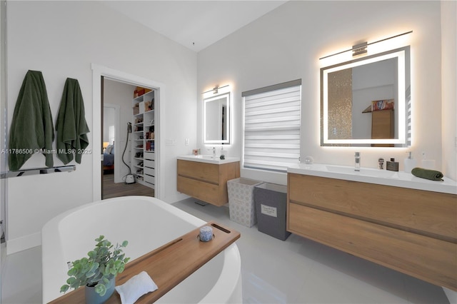 3953 SW 60th Ave, Miami, FL 33155 - full bath with a freestanding tub, two vanities, and a walk in closet