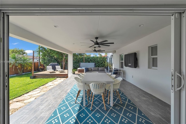 3953 SW 60th Ave, Miami, FL 33155 - view of patio featuring a fenced backyard, outdoor dining space, a ceiling fan, and a deck