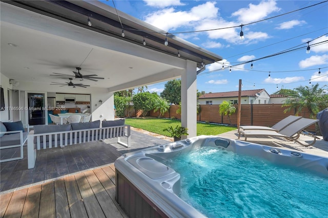3953 SW 60th Ave, Miami, FL 33155 - wooden deck with an outdoor hot tub, a ceiling fan, and an outdoor living space