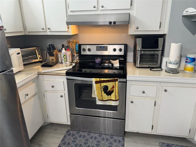 11329 Royal Palm Blvd Unit C-1, Coral Springs, FL 33065 - bedroom featuring light wood finished floors