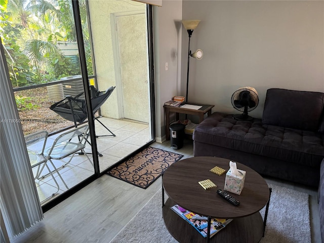 living room with wood finished floors