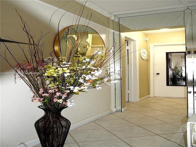 hallway featuring light tile patterned flooring