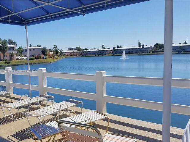 800 SW 11th Ave Unit 19A, Hallandale Beach, FL 33009 - dock featuring a water view and fence