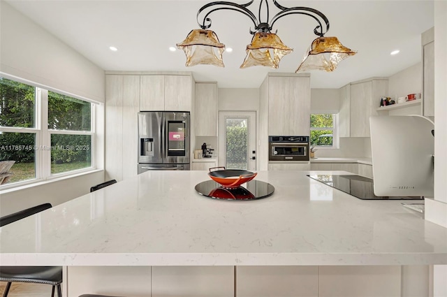 36355 SW 192nd Ave, Homestead, FL 33034 - kitchen featuring oven, open shelves, modern cabinets, black electric stovetop, and stainless steel refrigerator with ice dispenser