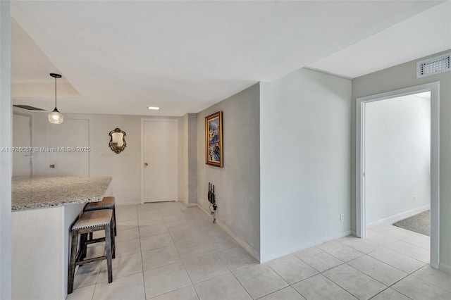 3000 Holiday Dr Unit 306, Fort Lauderdale, FL 33316 - hall featuring light tile patterned floors and baseboards