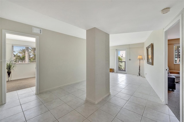 3000 Holiday Dr Unit 306, Fort Lauderdale, FL 33316 - spare room with light tile patterned floors, a smoke detector, and baseboards