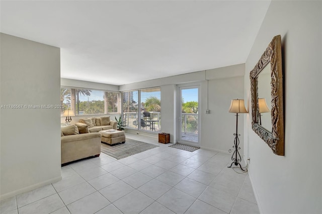 3000 Holiday Dr Unit 306, Fort Lauderdale, FL 33316 - living room with baseboards and light tile patterned floors