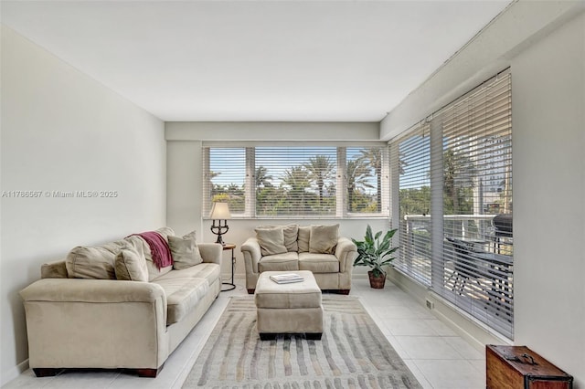 3000 Holiday Dr Unit 306, Fort Lauderdale, FL 33316 - living room with light tile patterned floors and baseboards