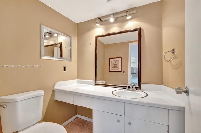 3000 Holiday Dr Unit 306, Fort Lauderdale, FL 33316 - bathroom with toilet, a sink, and tile patterned flooring