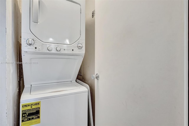 3000 Holiday Dr Unit 306, Fort Lauderdale, FL 33316 - laundry area with stacked washer / dryer