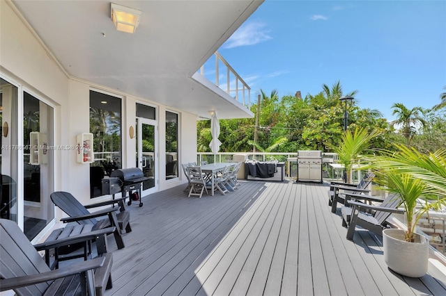 3000 Holiday Dr Unit 306, Fort Lauderdale, FL 33316 - wooden deck featuring outdoor dining area