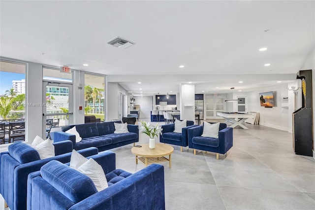3000 Holiday Dr Unit 306, Fort Lauderdale, FL 33316 - living room with recessed lighting and concrete flooring