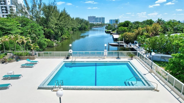 3000 Holiday Dr Unit 306, Fort Lauderdale, FL 33316 - community pool with a water view, a patio area, fence, and a dock