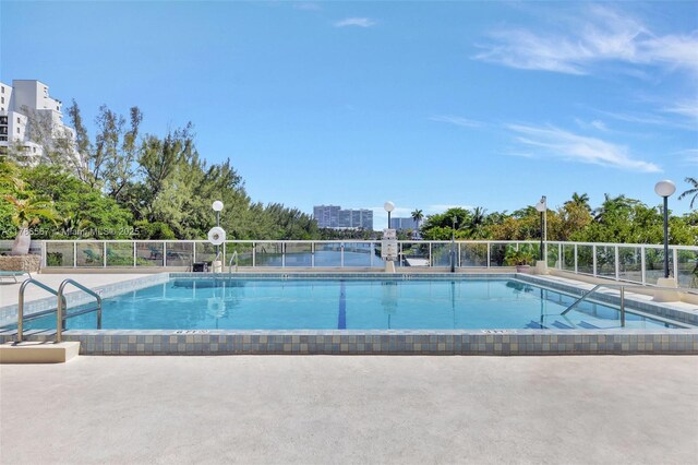 3000 Holiday Dr Unit 306, Fort Lauderdale, FL 33316 - community pool featuring fence