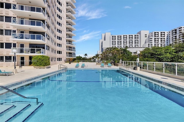 3000 Holiday Dr Unit 306, Fort Lauderdale, FL 33316 - community pool with fence and a patio area