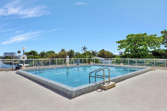 3000 Holiday Dr Unit 306, Fort Lauderdale, FL 33316 - community pool with a patio area