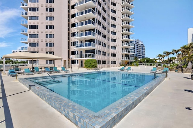 3000 Holiday Dr Unit 306, Fort Lauderdale, FL 33316 - community pool featuring a patio