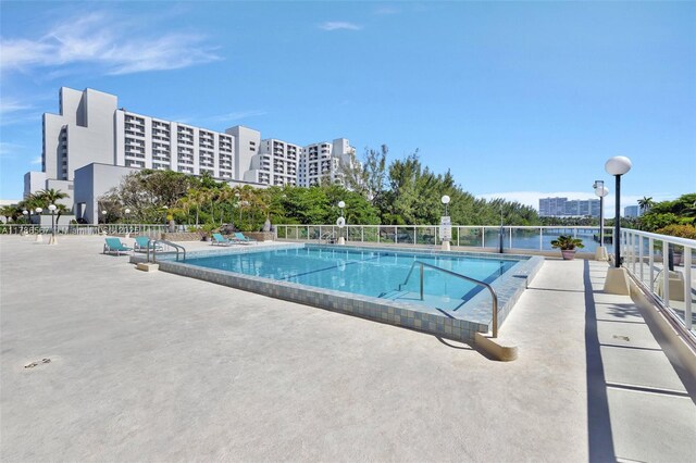 3000 Holiday Dr Unit 306, Fort Lauderdale, FL 33316 - community pool with a patio area