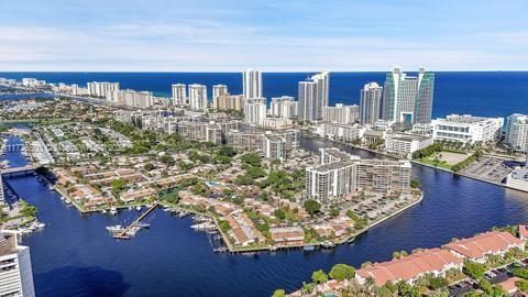 view of urban area with a large body of water
