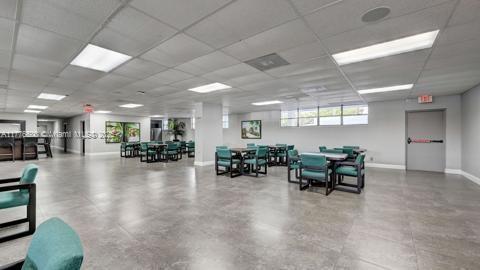 common area featuring a drop ceiling