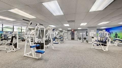 gym with a drop ceiling
