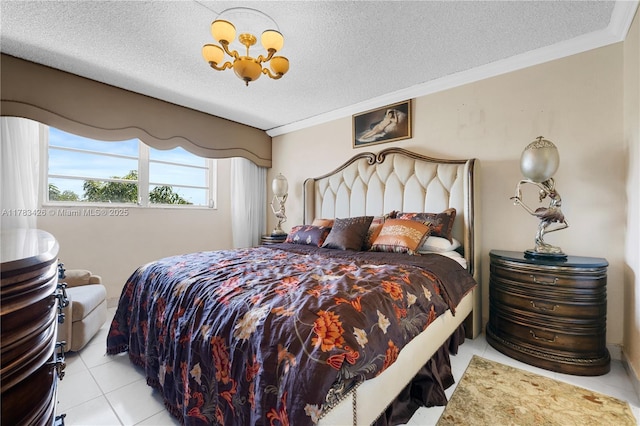 tiled bedroom featuring ornamental molding, a chandelier, and a textured ceiling