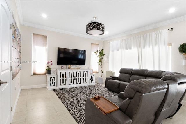 living room with recessed lighting, plenty of natural light, crown molding, and baseboards