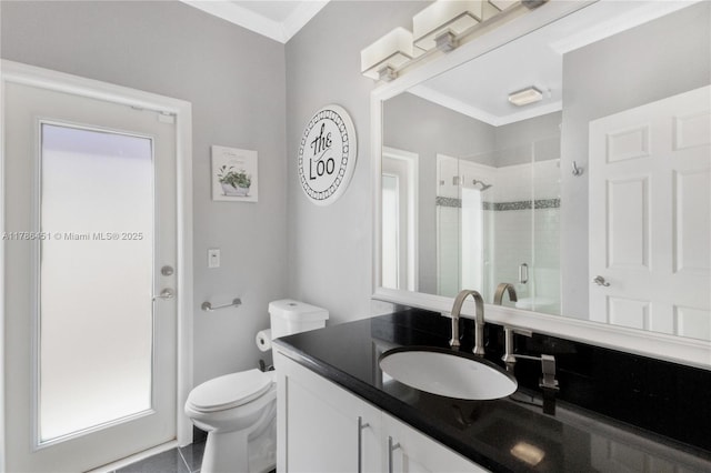 full bath with crown molding, vanity, toilet, and a stall shower