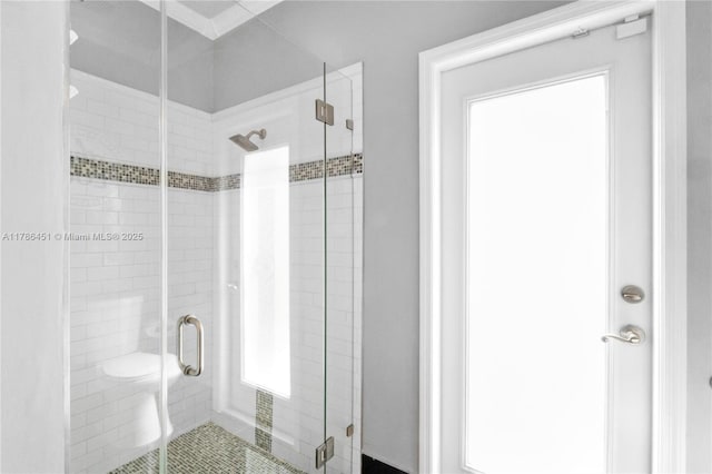 bathroom featuring a shower stall