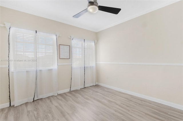unfurnished bedroom featuring baseboards, a ceiling fan, and wood finished floors
