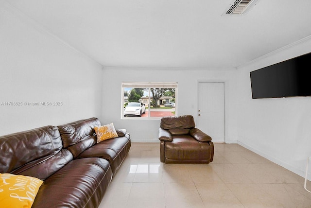 6200 Wiley St, Hollywood, FL 33023 - living area with light tile patterned flooring, baseboards, visible vents, and crown molding