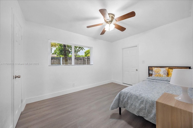 6200 Wiley St, Hollywood, FL 33023 - bedroom with wood finished floors, a ceiling fan, and baseboards