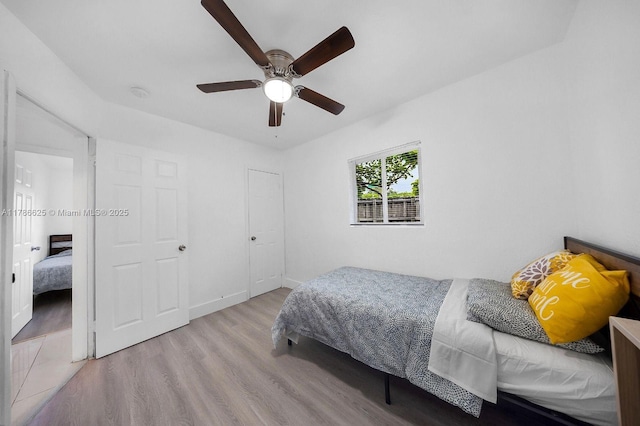 6200 Wiley St, Hollywood, FL 33023 - bedroom featuring baseboards, wood finished floors, and ceiling fan