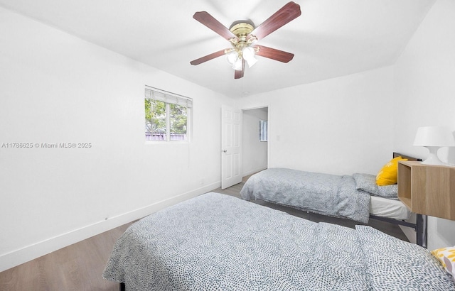 6200 Wiley St, Hollywood, FL 33023 - bedroom with baseboards, a ceiling fan, and wood finished floors