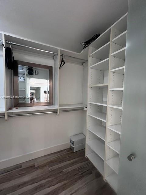 600 NE 36th St Unit 1706, Miami, FL 33137 - spacious closet featuring wood finished floors