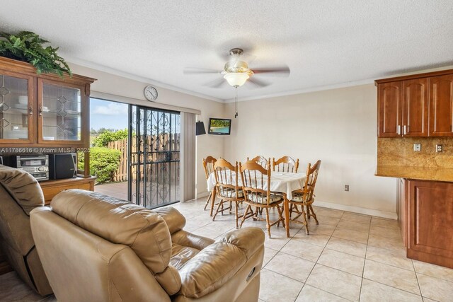 844 SW 134th Pl, Miami, FL 33184 - interior space with ceiling fan, ornamental molding, a textured ceiling, and light tile patterned floors