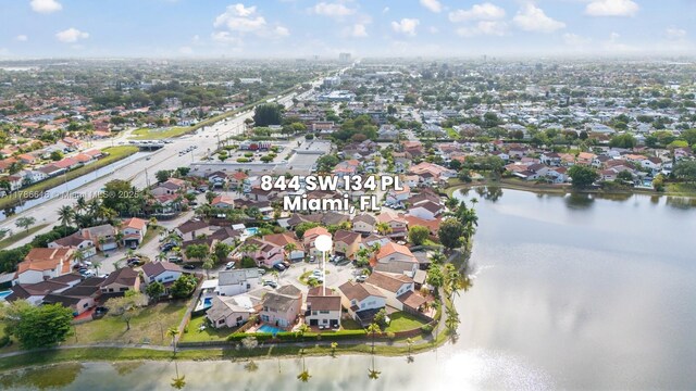 844 SW 134th Pl, Miami, FL 33184 - birds eye view of property with a residential view and a water view