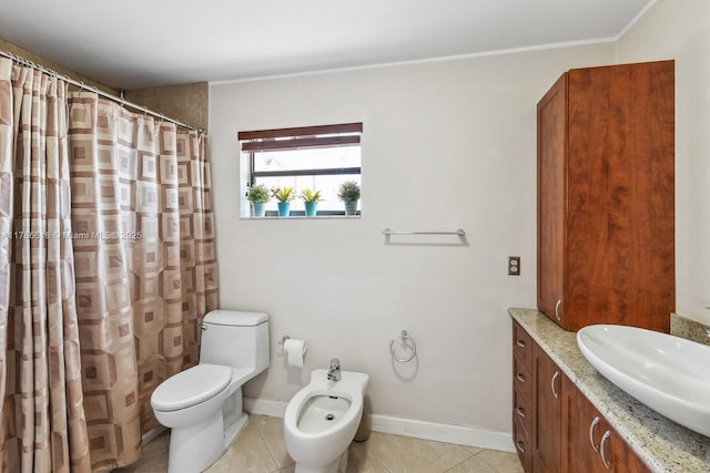 844 SW 134th Pl, Miami, FL 33184 - full bathroom with tile patterned floors, vanity, a shower with curtain, toilet, and a bidet