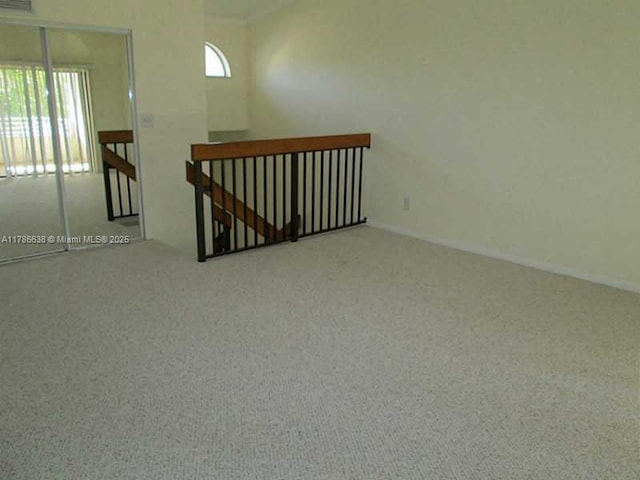 323 Ives Dairy Rd Unit 323-05, Miami, FL 33179 - unfurnished room with baseboards and carpet