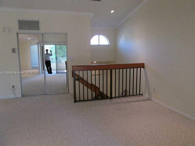 323 Ives Dairy Rd Unit 323-05, Miami, FL 33179 - corridor featuring visible vents, carpet, an upstairs landing, and ornamental molding