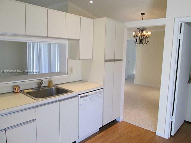 323 Ives Dairy Rd Unit 323-05, Miami, FL 33179 - kitchen featuring a chandelier, dishwasher, white cabinets, and a sink