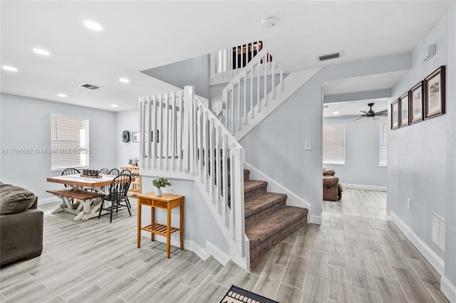 11640 SW 243rd St, Homestead, FL 33032 - stairs featuring baseboards, a ceiling fan, wood finished floors, and visible vents