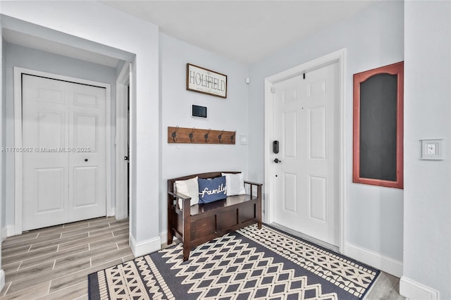 11640 SW 243rd St, Homestead, FL 33032 - foyer featuring wood finished floors and baseboards